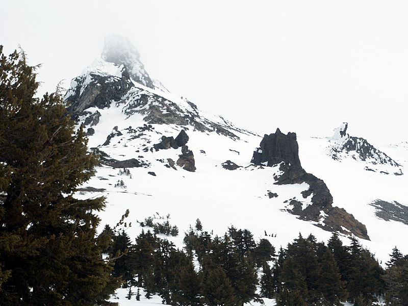The peak peaks through