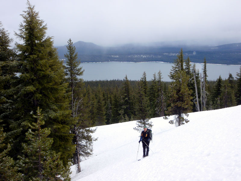 Mark climbing the ridge, Crescent Lake behind