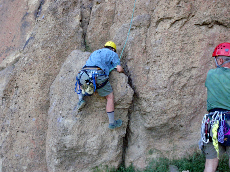 Crux move onto the boulder