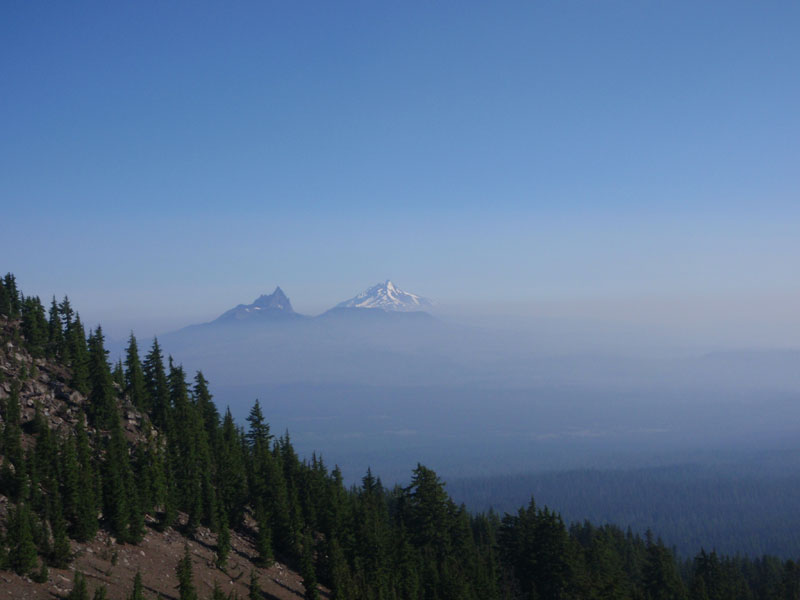 Smoke from the &#8220;Rooster Rock&#8221; fire (south of town of Sisters) obscures view of Three Fingered Jack and Mt. Jefferson