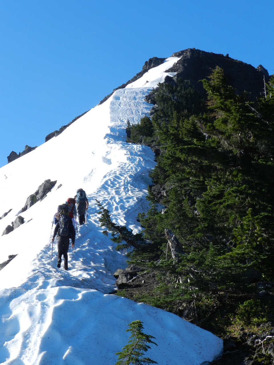 Hiking up the snow on the north ridge