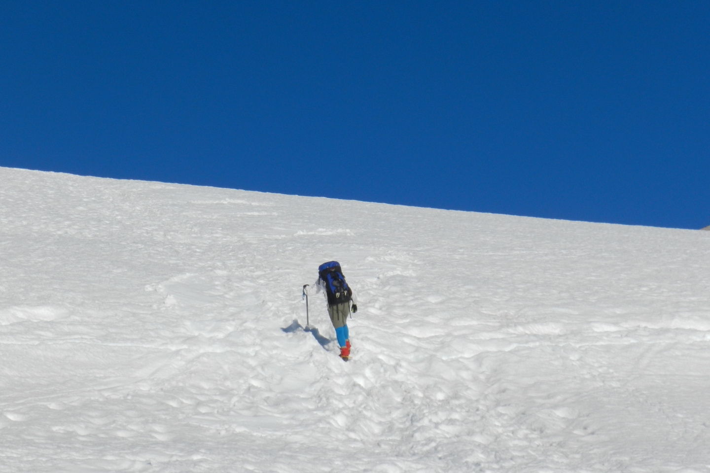Lili stepping across a small crevasse on the upper Cool